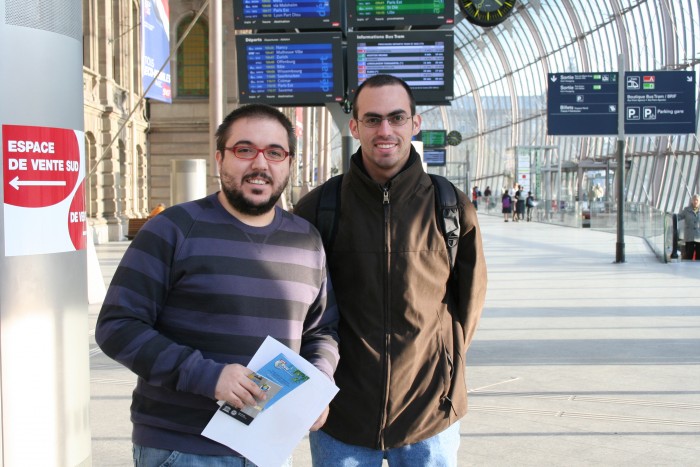 Jose and Fernando in the train station, after getting some maps in the information office
